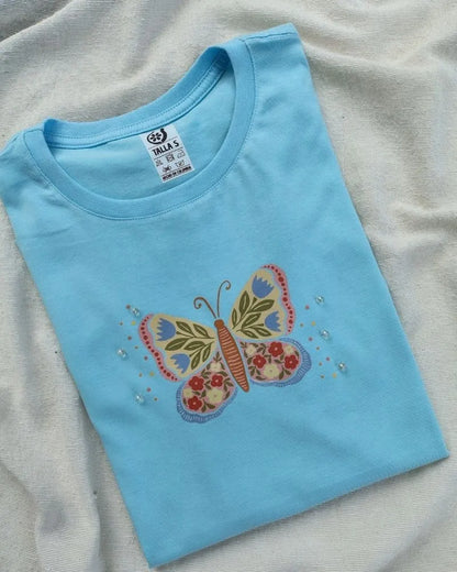 CAMISETA MARIPOSA CON PERLAS